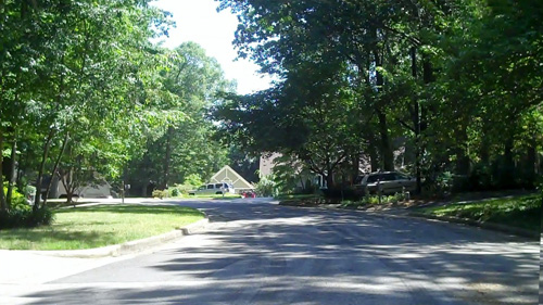 Peaceful tree-lined streets of North Ridge neighborhood.